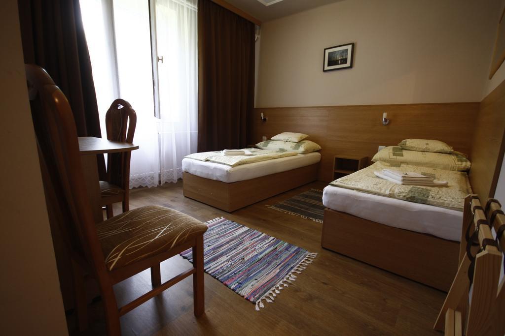 Parti Panzio Hotel Тата Екстериор снимка